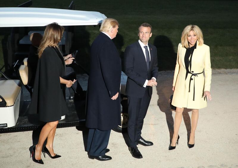 US President Donald Trump and First Lady Melania Trump stand with French President Emmanuel Macron and his wife, Brigitte Macron following a dinner at Mount Vernon, the estate of the first US President George Washington, in Mount Vernon, Virginia, April 23, 2018. Ludovic Marin / AFP