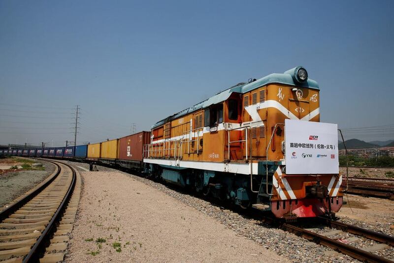 A train carrying containers from London arrives at the freight railway station in Yiwu, Zhejiang province, China, April 29, 2017.  The sign at the front of the train reads: "First Sino-Euro Freight Train (London Yiwu). REUTERS/Thomas Peter