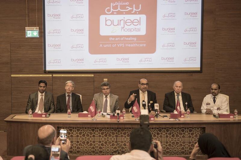  Dr Yassin El Shahat, Burjeel Hospital chief medical officer, fourth from left, said sitting may boost Ms El Aty. Vidhyaa for The National 
