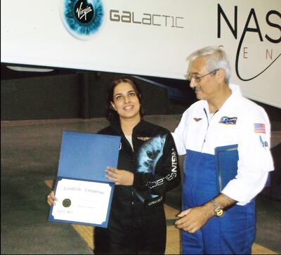 Ms Salim receives her suborbital spaceflight training certificate and training wings. Photo: Namira Salim