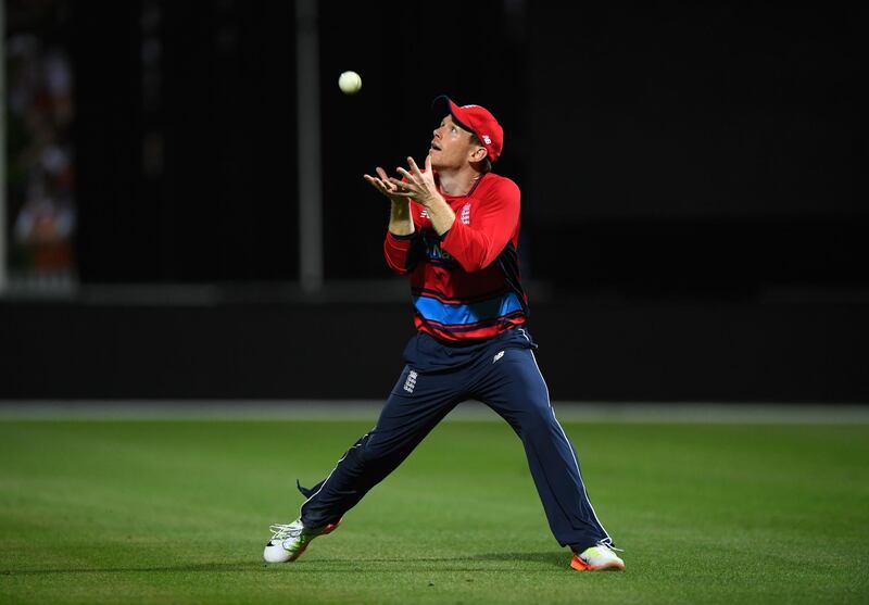 HAMILTON, NEW ZEALAND - FEBRUARY 18: England captain Eoin Morgan takes the catch to dismiss Ross Taylor during the International Twenty20 match between New Zealand and England at Seddon Park on February 18, 2018 in Hamilton, New Zealand.  (Photo by Stu Forster/Getty Images)