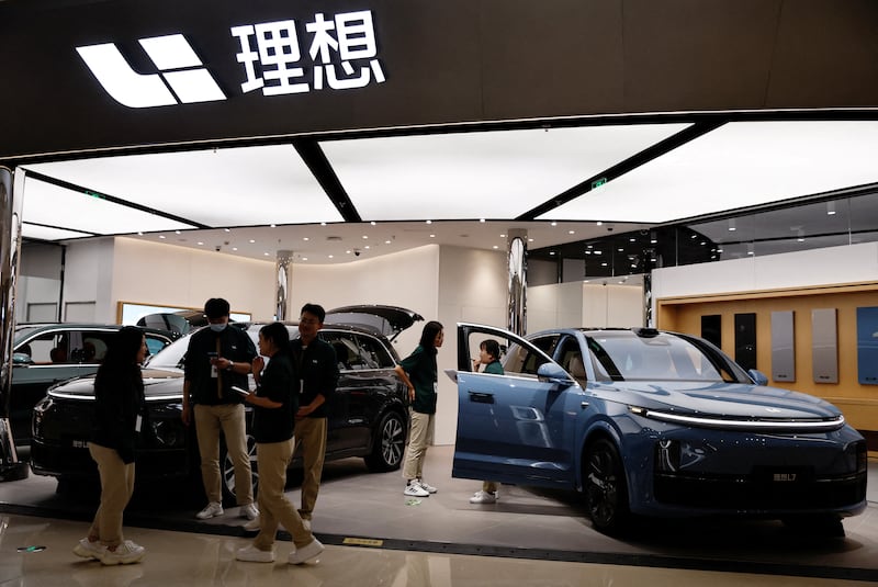 Chinese EV maker Li Auto's cars inside a shopping mall in Beijing, China. Reuters