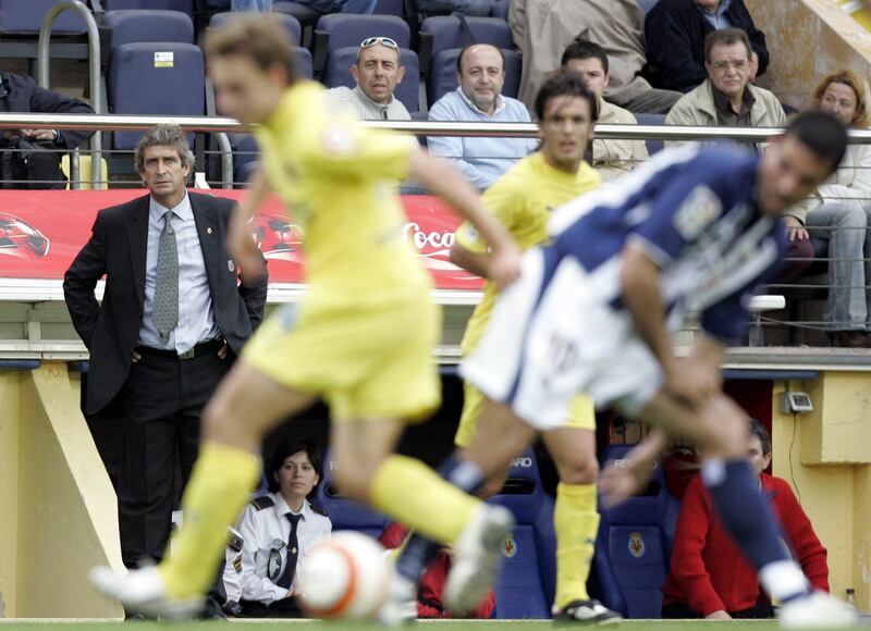 Villarreal coach Manuel Pellegrini from Chile, left, looks on  during the Spanish league soccer match against Real Sociedad at Madrigal Stadium in Villarreal, Spain, Saturday April 22, 2006. Real Sociedad won the match 2-0 (AP Photo/Fernando Bustamante)