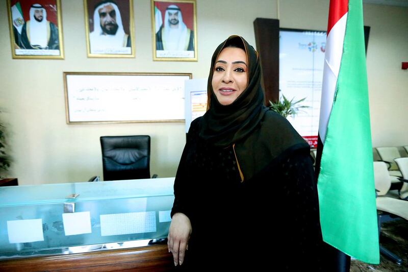 Jameela Al Shaiba Al Hameli, assistant general manager for corporate services at TransAD, encourages Emirati women to get an education and stand up for themselves. Fatima Al Marzooqi / The National
