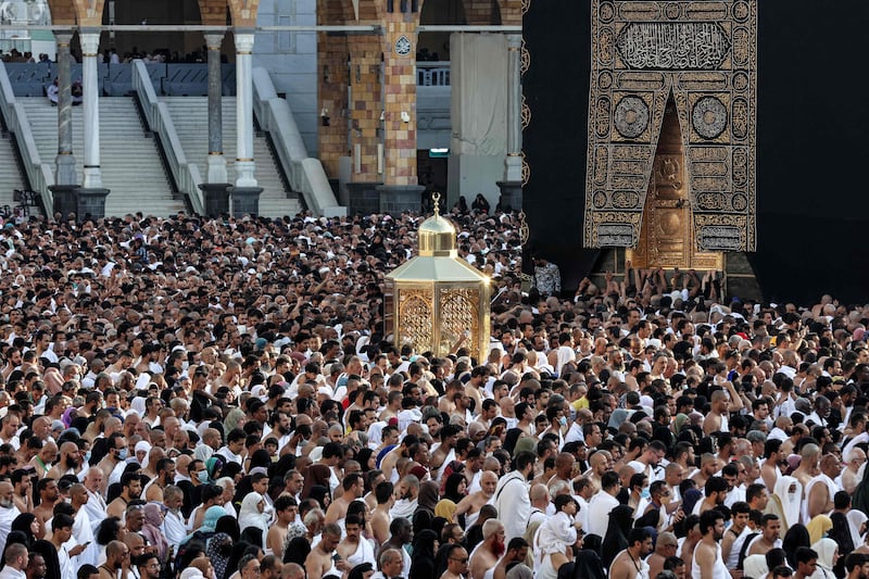 Muslim worshippers gather before the Kaaba, Islam's holiest shrine, at the Grand Mosque in Makkah