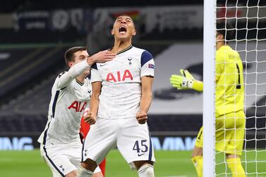 LONDON, ENGLAND - DECEMBER 10: Carlos Vinicius of Tottenham Hotspur celebrates with Giovani Lo Celso of Tottenham Hotspur after scoring his sides 1st goal after scoring their team's first goal during the UEFA Europa League Group J stage match between Tottenham Hotspur and Royal Antwerp at Tottenham Hotspur Stadium on December 10, 2020 in London, England. A limited number of fans (2000) are welcomed back to stadiums to watch elite football across England. This was following easing of restrictions on spectators in tiers one and two areas only. (Photo by Julian Finney/Getty Images)