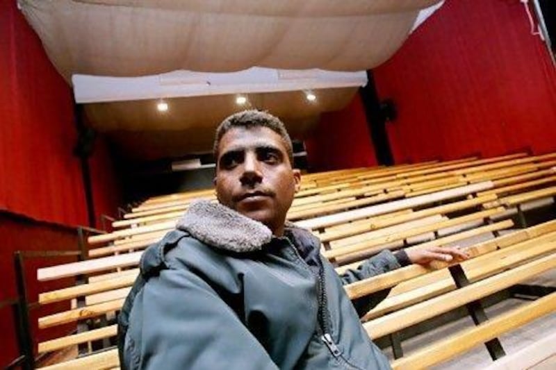 Former Palestinian militant Zakariya Zubeidi, 31, poses at the building of the newly formed Freedom Theatre in the West Bank refugee camp of Jenin in January 2008.