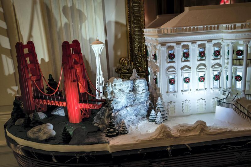 WASHINGTON, DC - DECEMBER 2 : Gingerbread house featuring the White House and landmarks from across the country are seen in the State Dining Room at the White House on Monday, Dec 02, 2019 in Washington, DC. "This year's theme, The Spirit of America, is a tribute to the traditions, customs, and history that make our Nation great. Designed by First Lady Melania Trump, the White House decorations celebrate the courageous individuals who have shaped our country and kept the American spirit alive." (Photo by Jabin Botsford/The Washington Post via Getty Images)