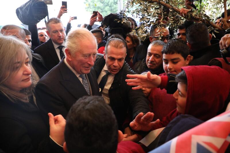 Prince Charles visits the compound of the Church of the Nativity. AFP