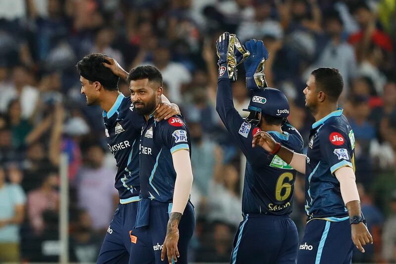 Sai Kishore, left, and Hardik Pandya celebrate the dismissal of Ravi Ashwin of Rajasthan Royals. Sportzpics for IPL