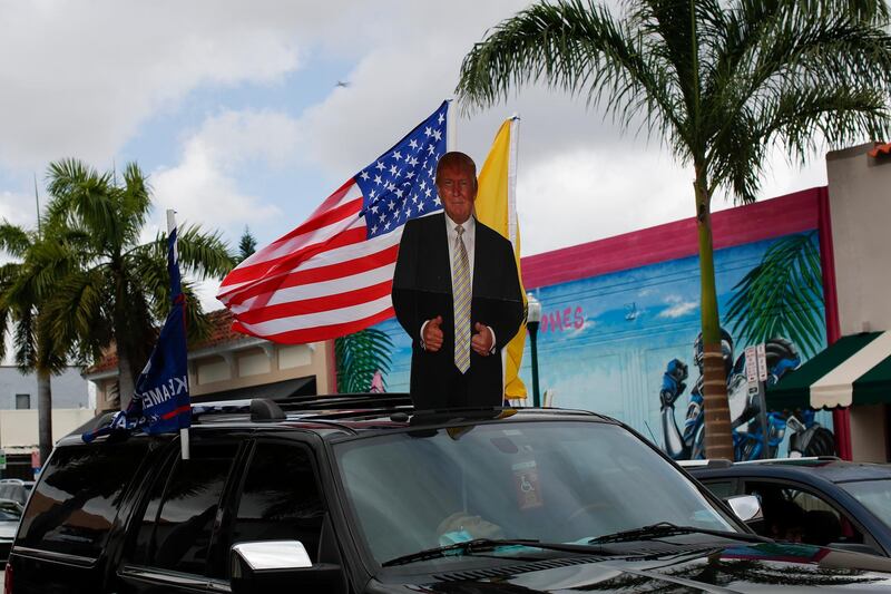 Supporters of President Donald Trump drive in caravan down Calle Ocho in the Little Havana neighborhood of Miami. AP Photo