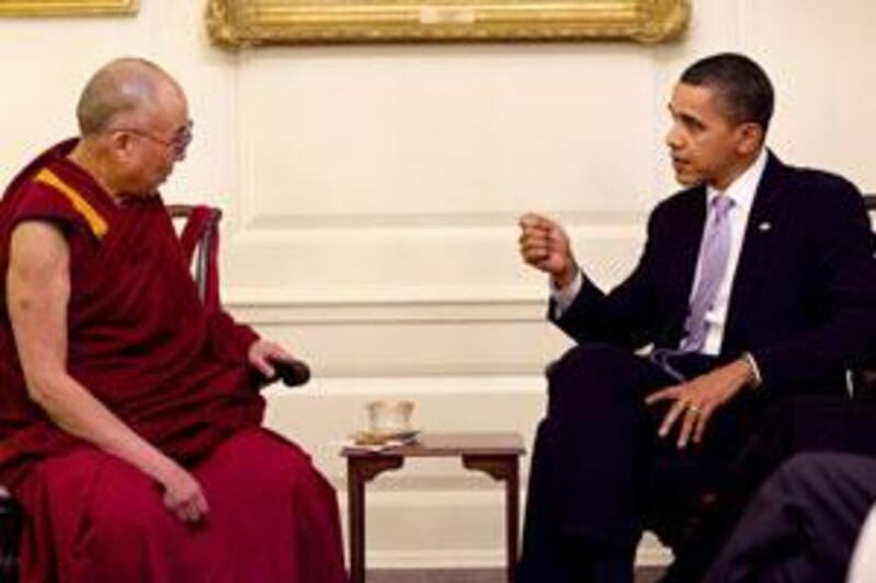 Barack Obama meets the Dalai Lama in the Map Room of the White House in Washington on Thursday.