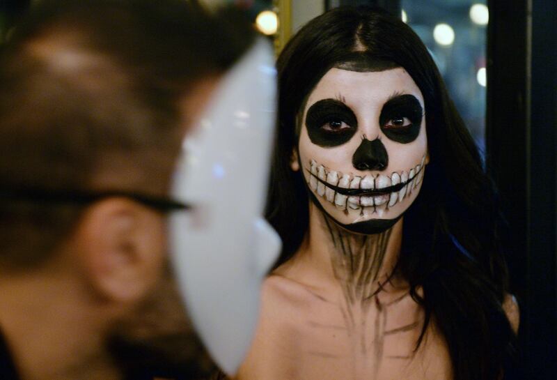 A woman in a costume attends the annual Halloween Party in Hazmieh, Beirut, Lebanon. EPA