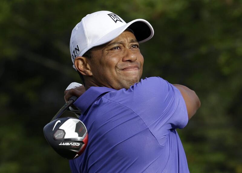 Tiger Woods removed himself from consideration for the Ryder Cup team Wednesday evening, Aug. 13, 2014 with a clear message that he is not healthy enough to play. AP Photo/John Locher