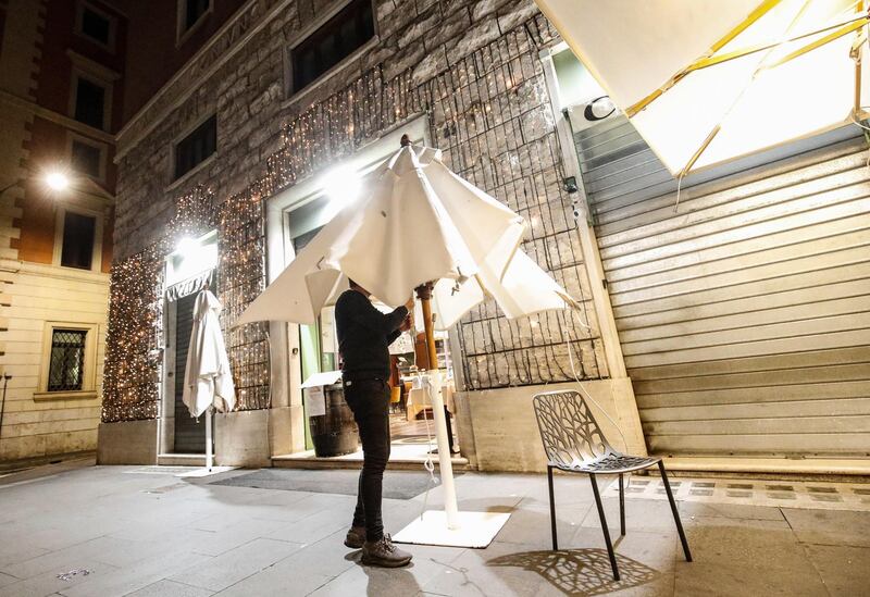 Bars and restaurants close for the curfew as part of the anti-coronavirus spread measures in Rome, Italy.  EPA