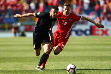 Ivan Perisic, left, scored Croatia's second goal in the 2-1 win over Wales on Saturday. Reuters