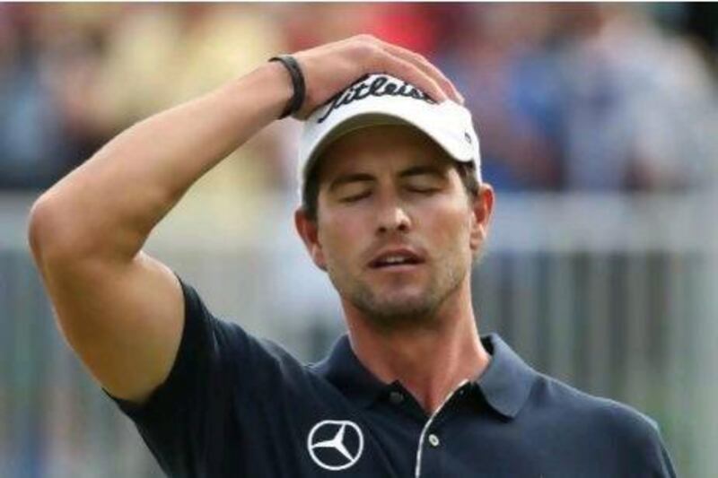 LYTHAM ST ANNES, ENGLAND - JULY 22: Adam Scott of Australia reacts to a missed par putt on the 18th green during the final round of the 141st Open Championship at Royal Lytham & St. Annes Golf Club on July 22, 2012 in Lytham St Annes, England. (Photo by Andrew Redington/Getty Images) *** Local Caption *** 149043680.jpg