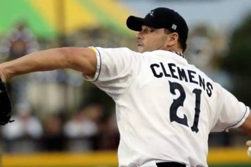 Sugar Land Skeeters Roger Clemens throws a pitch during a baseball game against the Bridgeport Bluefish Saturday, Aug. 25, 2012, in Sugar Land, Texas. Clemens, a seven-time Cy Young Award winner, signed with the Skeeters of the independent Atlantic League this week. (AP Photo/David J. Phillip) *** Local Caption *** Clemens Comeback Baseball.JPEG-02c52.jpg