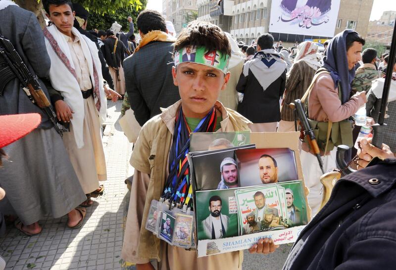 epa07516500 A Yemeni child displays posters of Houthi leaders for sale during a rally protesting the Saudi-led military campaign on Yemen, in Sana'a, Yemen, 19 April 2019. According to reports, nearly 10 thousand Yemeni people have been killed in the Arab countryâ€™s fighting over the past five months, raising the death toll 70 thousand since January 2016. A power struggle in Yemen between the Houthi rebels and the Saudi-backed Yemeni government escalated when the Saudi-led coalition launched an airstrike campaign against the Houthis, sparking a full-blown armed conflict.  EPA/YAHYA ARHAB