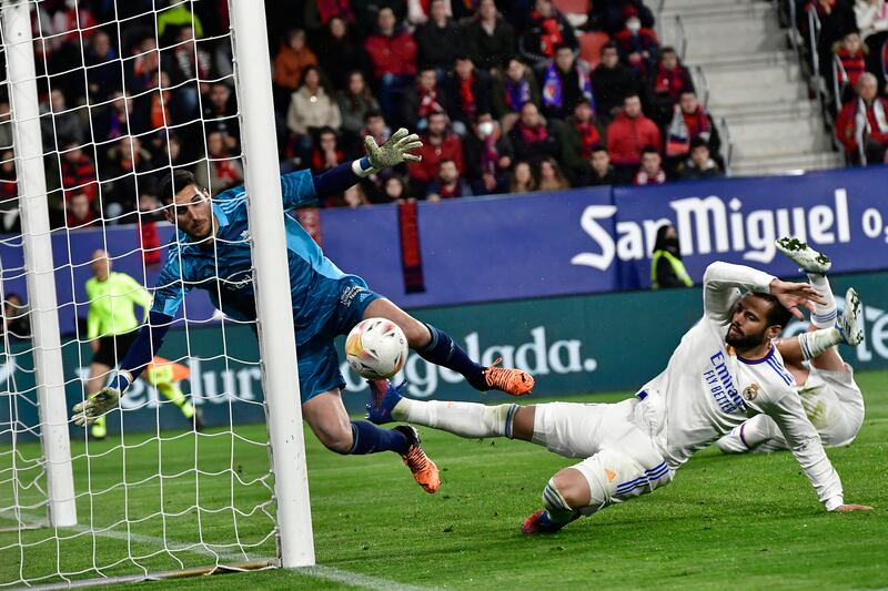 Real Madrid defender Nacho, right, misses a scoring opportunity against Osasuna. AP