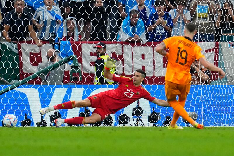 Wout Weghorst scores for the Netherlands during penalty shoot-out. AP