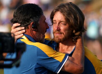An emotional Tommy Fleetwood celebrates with vice-captain Jose Maria Olazabal after Europe regained the Ryder Cup at the Marco Simone Golf and Country Club. PA