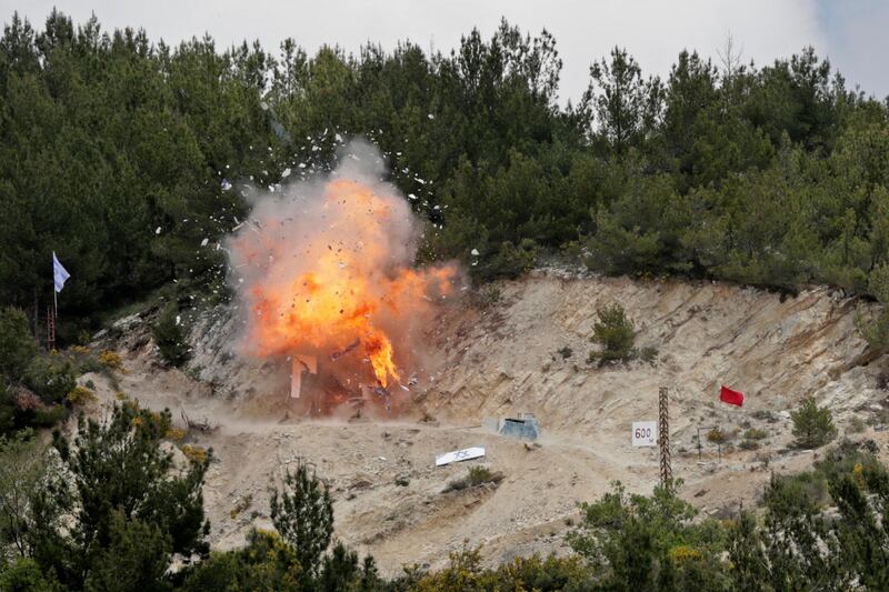 An explosion as the armed group stages a mock cross-border raid into Israel. AFP