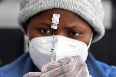 A nurse prepares a Pfizer-BioNTech Covid-19 shot at a public housing project pop-up vaccination site in Los Angeles, California, US. AFP