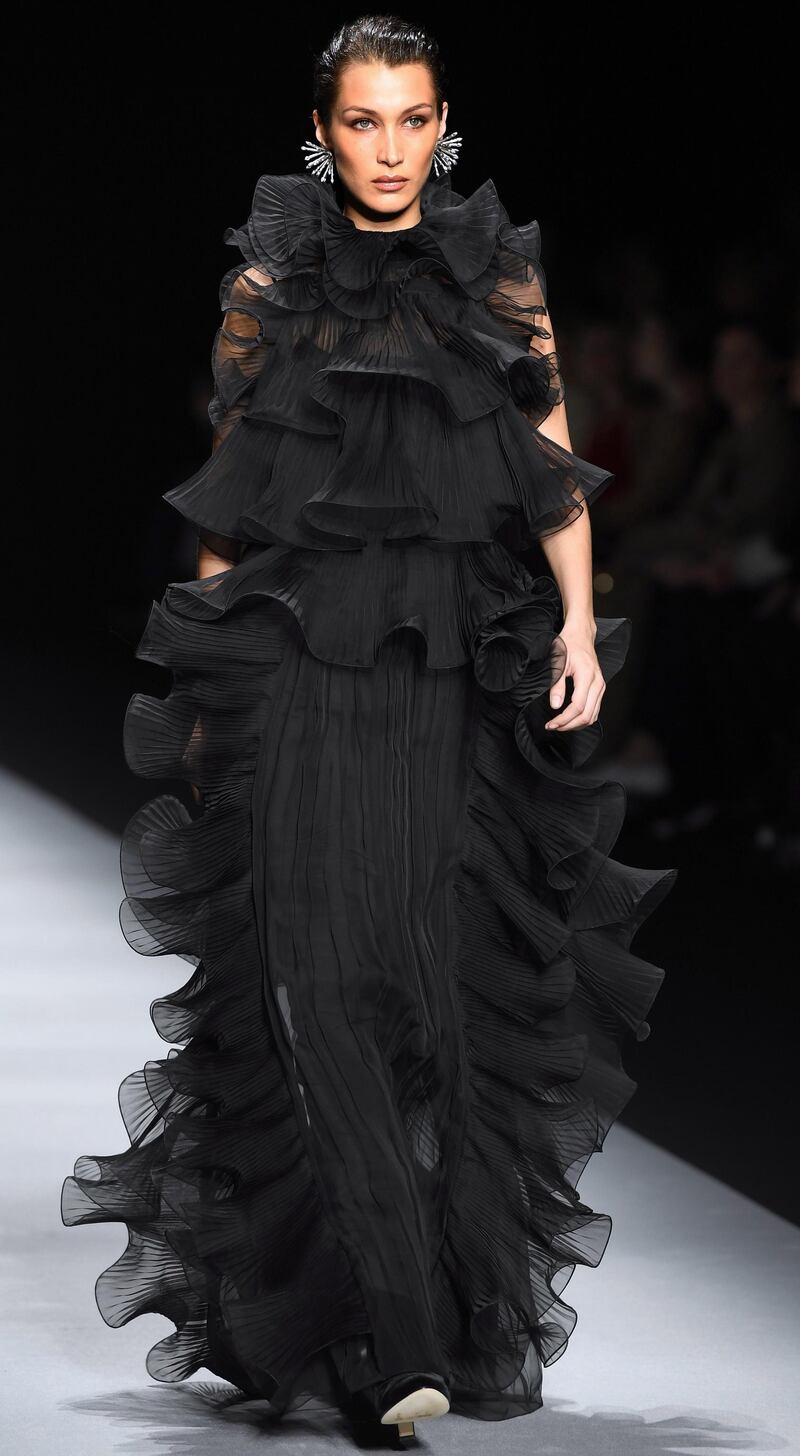 Bella Hadid presents a creation by Alberta Ferretti during Milan Fashion Week on February 19, 2020. EPA