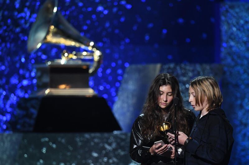 A touching moment: The children of late Chris Cornell Toni Cornell and Christopher Cornell Jr accept the award for Best Rock performance for 'When Bad Does Good' on behalf of their father, Chris Cornell. Cornell died in May 2017. AFP