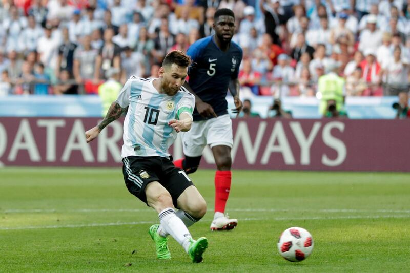 Argentina's Lionel Messi kicks the ball during the round of 16 match between France and Argentina. Ricardo Mazalan / AP Photo