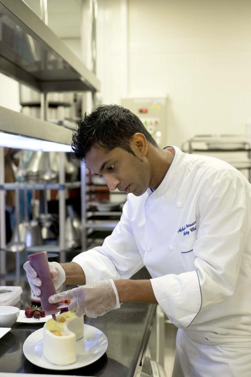 The resort pastry chef Achala Weerasinghe of the Madinat Jumeirah Hotel working on one of his creations. Achala is in Norway to compete in the World Association of Chef's Global Competition. Antonie Robertson / The National