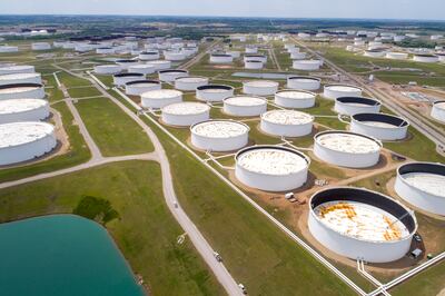 Crude oil storage tanks are seen in an aerial photograph at the Cushing oil hub in Cushing, Oklahoma. A prolonged period of high oil prices could trigger a resurgence of US shale production. Reuters