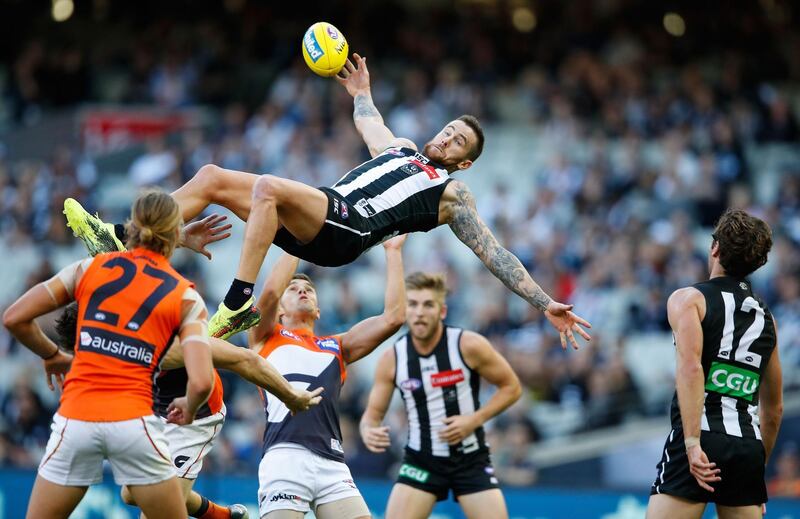 Jeremy Howe of the Magpies attempts to take a spectacular mark during the round two AFL match between the Collingwood Magpies and the Greater Western Sydney Giants at Melbourne Cricket Ground, in Melbourne, Australia. Scott Barbour / Getty Images