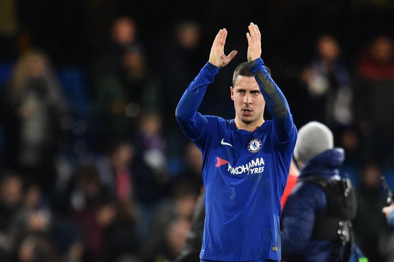 Chelsea's Belgian midfielder Eden Hazard applauds the crowd after a UEFA Champions League Group C football match between Chelsea and Atletico Madrid at Stamford Bridge in London on December 5, 2017. / AFP PHOTO / Glyn KIRK