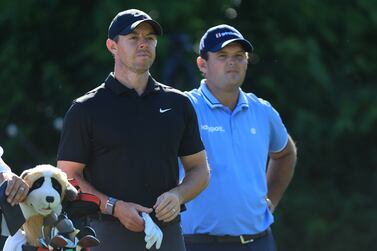 DUBLIN, OHIO - JUNE 03: Rory McIlroy of Northern Ireland and Patrick Reed of the United States look on from the 15th tree during the second round of the Memorial Tournament presented by Workday at Muirfield Village Golf Club on June 03, 2022 in Dublin, Ohio.    Sam Greenwood / Getty Images / AFP
