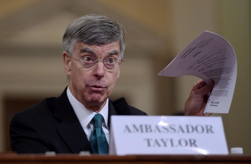 Top US diplomat in Ukraine William Taylor testifies during the House Intelligence Committee on Capitol Hill in Washington, DC on November 13, 2019, at the first public impeachment hearing of President Donald Trump's efforts to tie US aid for Ukraine to investigations of his political opponents. Donald Trump faces the most perilous challenge of his three-year presidency as public hearings convened as part of the impeachment probe against him open under the glare of television cameras on Wednesday. / AFP / Olivier Douliery
