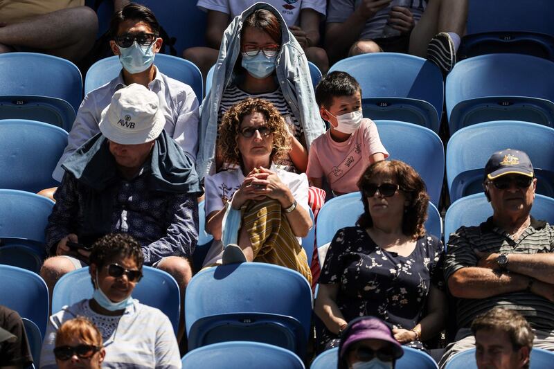 Fans watch Garbine Muguruza play against Zarina Diyas on day five of the Australian Open. AFP