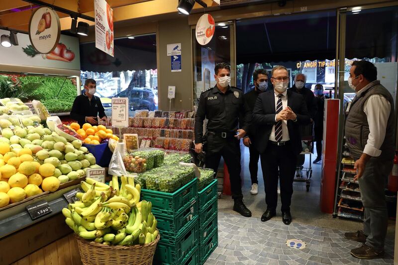 District Governor of Beyoglu Mustafa Demirelli visits a supermarket to check the measures to control the spread of coronavirus disease, in Istanbul, Turkey. Reuters