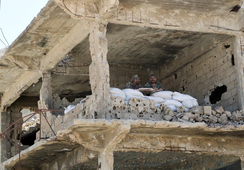 Syrian military in Deraa, where army positions have been hit by Israeli air strikes. Reuters