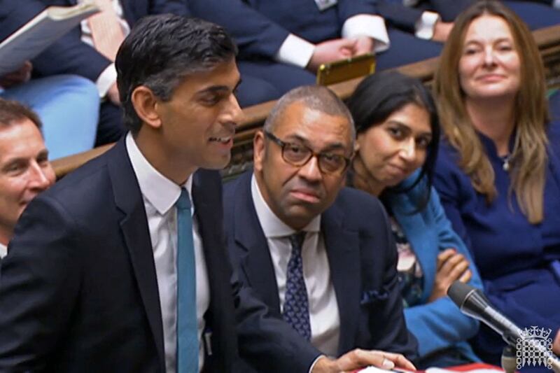Ms Braverman, second right, watches Mr Sunak during his first Prime Minister's Questions in the House of Commons in 2022. AFP