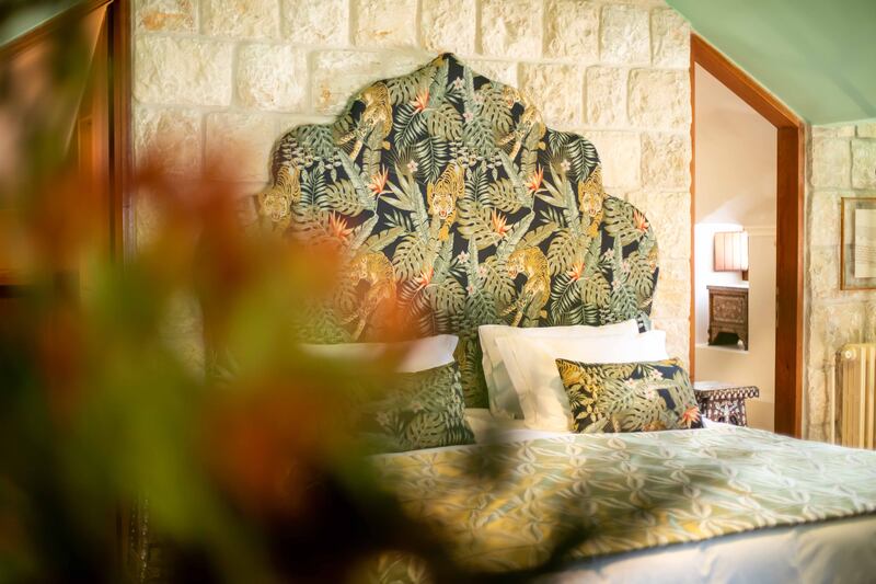 The Pasha Suite has bold fabrics and a soothing green palette