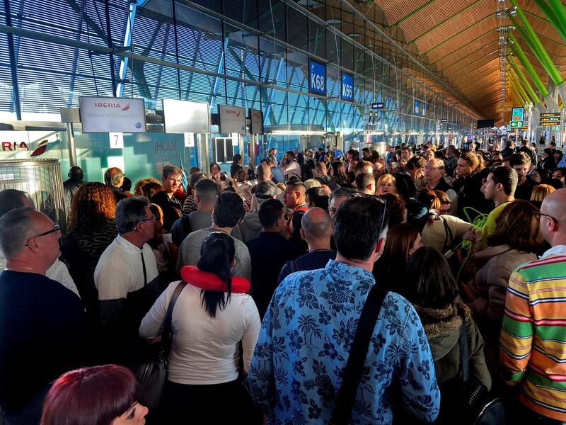 Hundreds of people await at Madrid-Barajas Adolfo Suarez Airport as flights to the Canary islands have been either canceled or delayed, in Madrid, Spain.  EPA