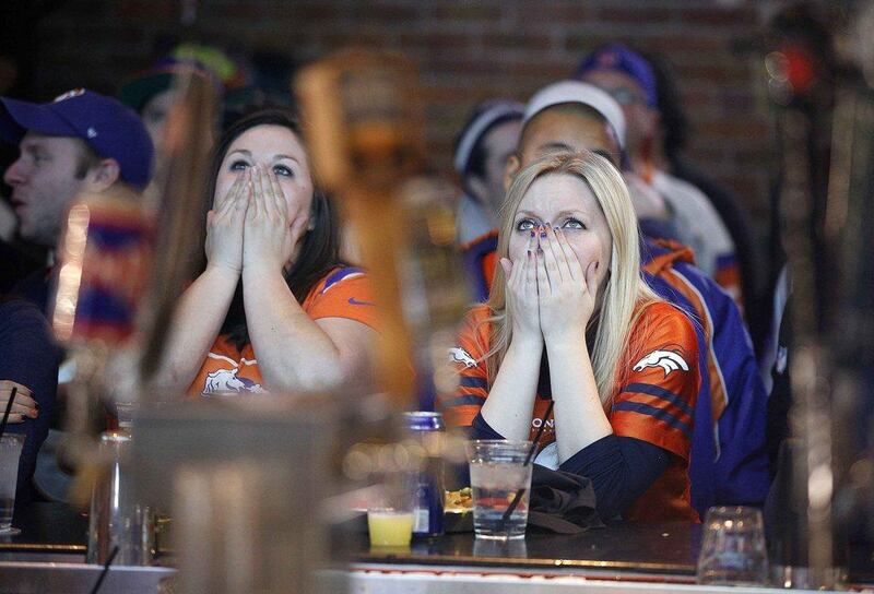 Denver Broncos fans react to the Super Bowl loss at a restaurant in Denver, Colorado on Sunday. Marc Piscotty / Reuters