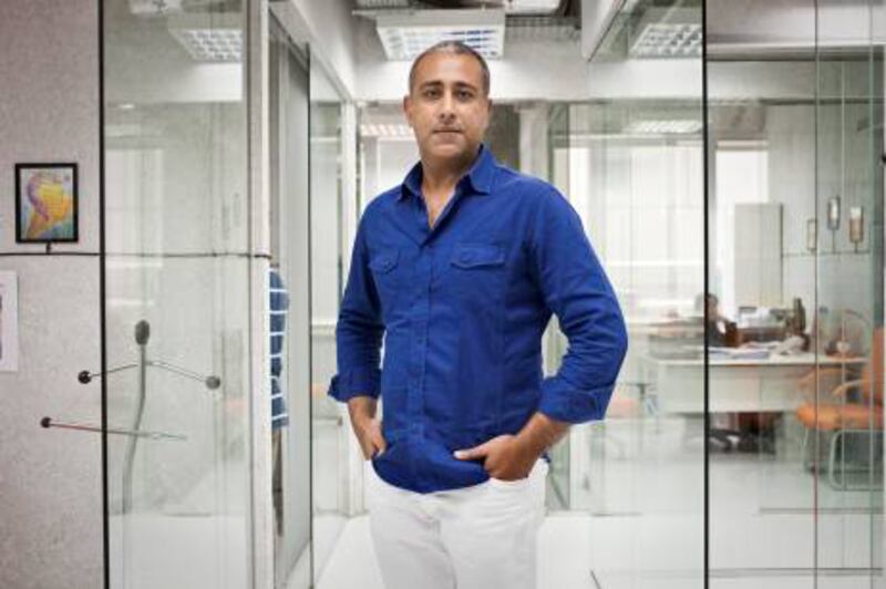 Dubai - United Arab Emirates - September 17 2012 - Yusef Pingor poses for a portrait at his office. Yusef is a landlord who has been scammed by "Sam" and has lost Dhs 85,000 through him. (Razan Alzayani / The National) *

*Editors Note : Yusef did not want the cheque to be photographed. 