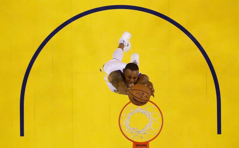 Golden State Warriors' Andre Iguodala goes up for a dunk against the Houston Rockets during the first half in Game 3 of the NBA basketball Western Conference Finals in Oakland, California. Marcio Jose Sanchez / AP Photo