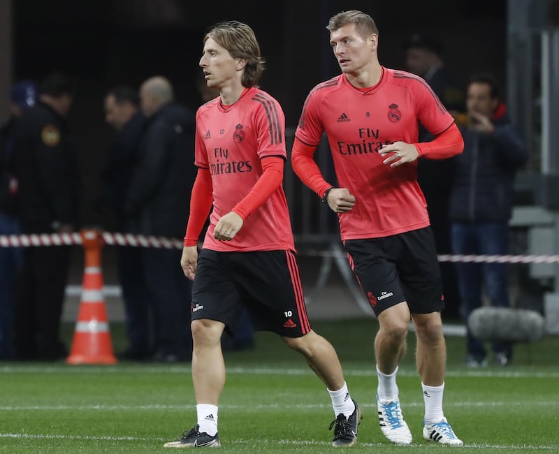 Toni Kroos, right, and Luka Modric attend a training session. EPA
