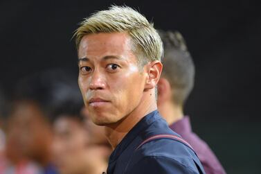 Keisuke Honda has marketed himself to Manchester United and AC Milan in an unusual and apparently desperate Twitter plea, as he hunts for a new club. AFP