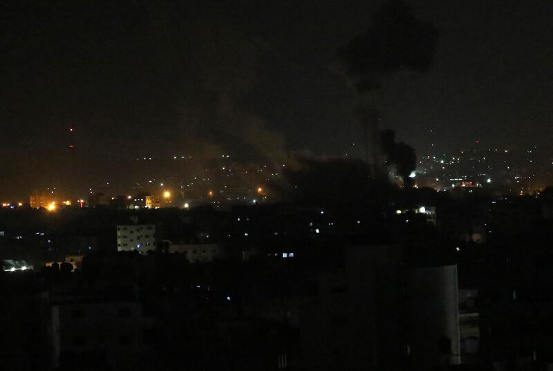 An explosion by Israeli airstrikes is seen in Gaza City, Tuesday, Aug. 18, 2020. Israeli forces struck targets across the Gaza Strip in response to rocket attacks and balloons from Gaza to the Israeli cities. (AP Photo/Adel Hana)