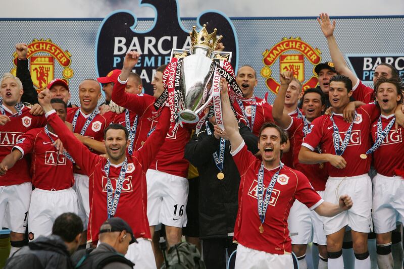 Giggs and Gary Neville of Manchester United lift the Premier League trophy in May 2007. Getty Images